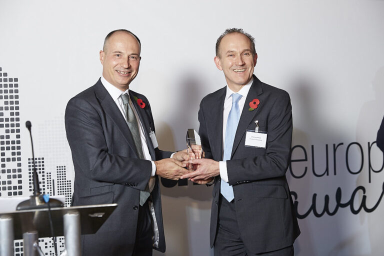 2. CIO of the Year – Nick Mustoe, Invesco Perpetual. Accepted by Dean Newman, presented by Philippe Lespinard.jpg